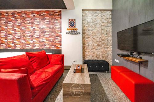 TV a/nebo společenská místnost v ubytování 羅東夜市 工業Loft旅宿