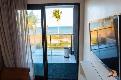 En eller flere senge i et værelse på Portal beira Mar