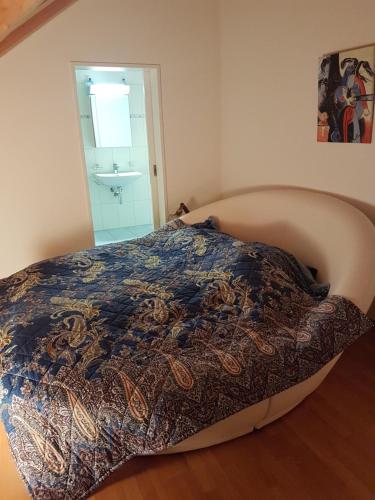 Ένα ή περισσότερα κρεβάτια σε δωμάτιο στο Penthouse Apartment in Davos