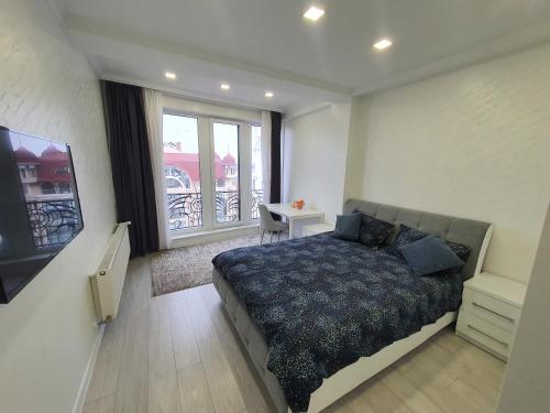 Bernardazzi residence tesisinde bir odada yatak veya yataklar