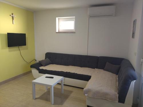 Μια τηλεόραση ή/και κέντρο ψυχαγωγίας στο Apartmani Masline Međugorje
