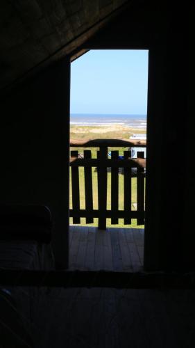 Balkón nebo terasa v ubytování Chalé Mar a Vista Conforto e Pé na areia