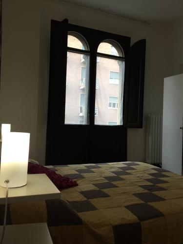 Posteľ alebo postele v izbe v ubytovaní B & B 21 Bologna