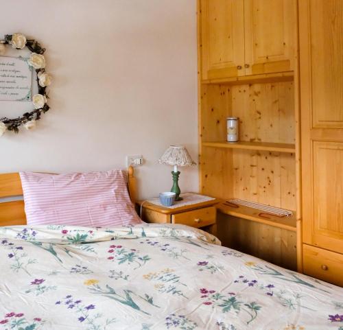 Postel nebo postele na pokoji v ubytování Casa Sappada Appartamento