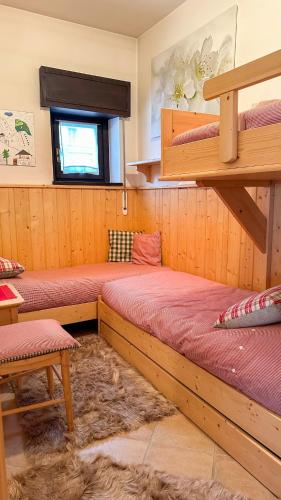 Postel nebo postele na pokoji v ubytování Casa Sappada Appartamento