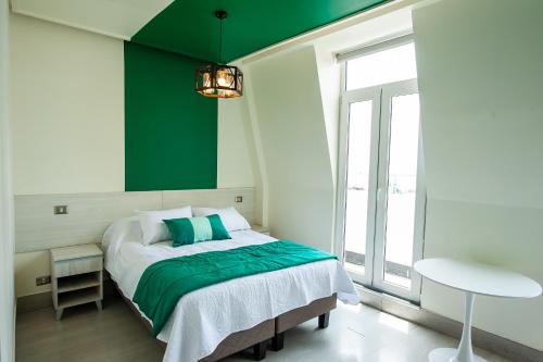 Postel nebo postele na pokoji v ubytování Casa Esmeralda