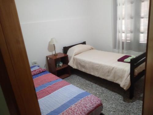 Voodi või voodid majutusasutuse Azul GUIDO SPANO toas