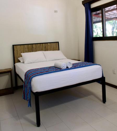 Postel nebo postele na pokoji v ubytování Rio Lindo Hotel