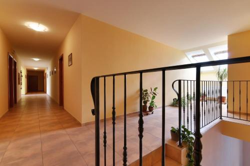 a hallway with a staircase in a house at Penzion U Zamku in Lednice