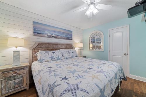 Postel nebo postele na pokoji v ubytování Seaside Beach & Racquet Club 4711