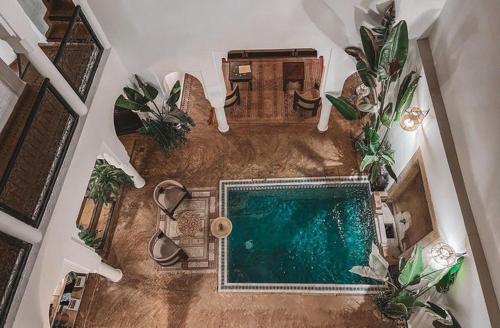 an overhead view of a swimming pool in a house at Riad Baba Ali in Marrakesh