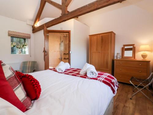 Katil atau katil-katil dalam bilik di Shire Cottage