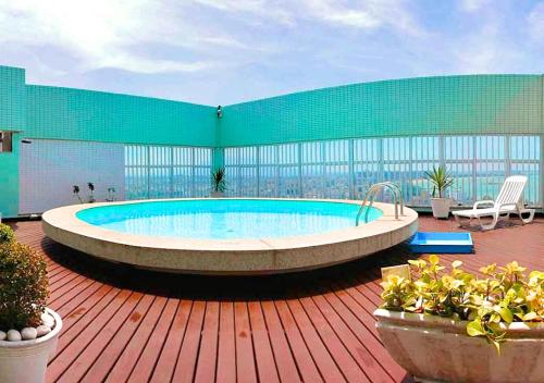 Πισίνα στο ή κοντά στο Flat 805 Triângulo Apart