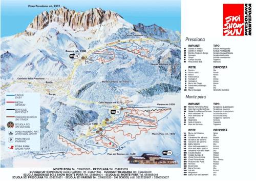 a map of a ski slope with a mountain in the background at Presolana House in Castione della Presolana