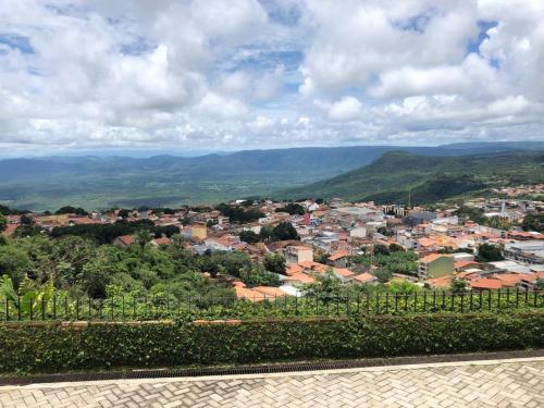 a view of a town from a hill with a city at Casa de Serra Vila Viçosa in Viçosa do Ceará
