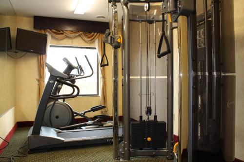a room with a gym with a treadmill at Red Roof Inn & Suites Detroit - Melvindale/Dearborn in Melvindale