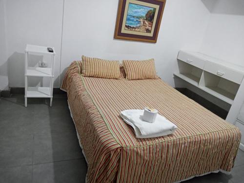 Ένα ή περισσότερα κρεβάτια σε δωμάτιο στο Macarena Houses