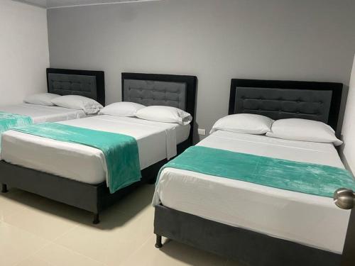Krevet ili kreveti u jedinici u objektu Hotel Dulces Sueños