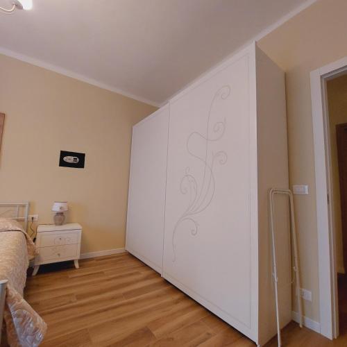 Postel nebo postele na pokoji v ubytování A CASA DI BICE&SISSI - vicino all'Allianz Stadium, centro città, Parco Dora, facoltà di informatica