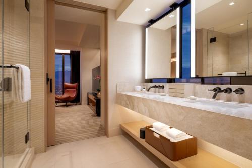 a bathroom with a large sink and a shower at Durango Casino & Resort in Las Vegas