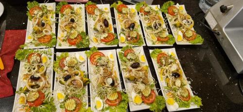 a bunch of plates of food on a table at Meyers Hua Hin in Hua Hin
