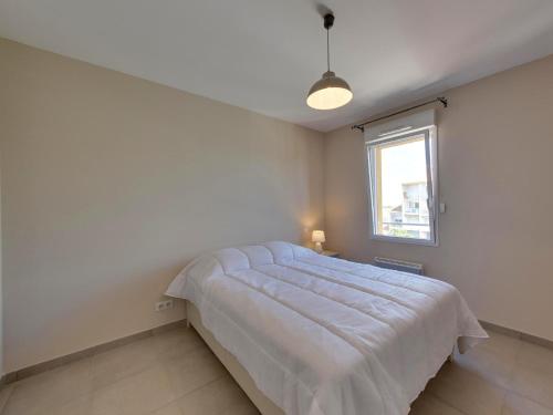 Postel nebo postele na pokoji v ubytování Appartement Châtelaillon-Plage, 2 pièces, 4 personnes - FR-1-706-4
