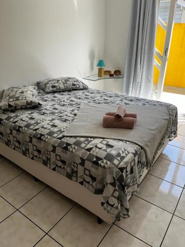 מיטה או מיטות בחדר ב-Stúdio campeche