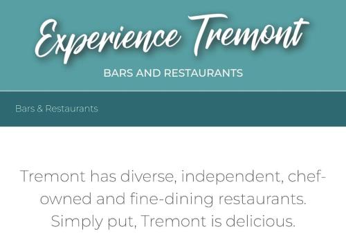 a sign that reads experience framework has diverse independent and owned and fire dining restaurants at Tremont Smart 10 - A KCM Property in Cleveland