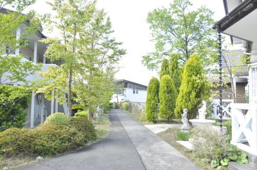 Jardín al aire libre en 修善寺フォーレスト 天然温泉が24時間楽しめキッチン電子レンジダイニングテーブル完備