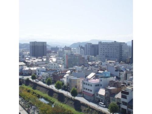 a city view of a city with buildings at Tottori City Hotel / Vacation STAY 81359 in Tottori
