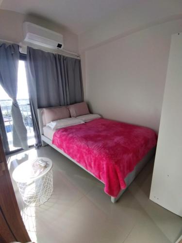 Cama o camas de una habitación en Bloom Residences Condo 2Br