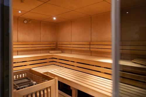 an empty sauna with wooden panels at Das Moerisch in Seeboden