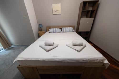 Katil atau katil-katil dalam bilik di Lux Place Apartments Downtown