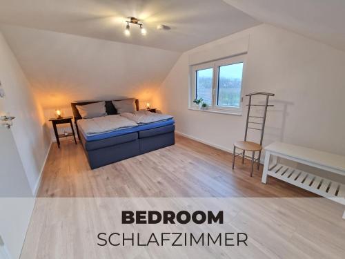 Ένα ή περισσότερα κρεβάτια σε δωμάτιο στο Angel’s Sky Apartment Bühl