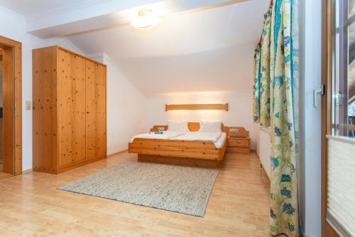 Cama o camas de una habitación en Tischlerwirt