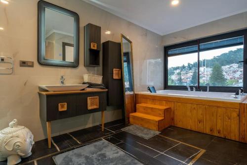 Koupelna v ubytování Tatilde Villam