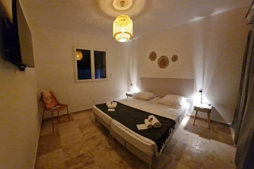 Ένα ή περισσότερα κρεβάτια σε δωμάτιο στο "Villa Querciu" Villa neuve & piscine privée