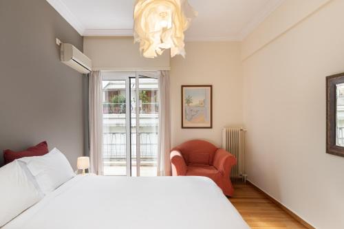 Llit o llits en una habitació de Athenian Apartment in Kolonaki