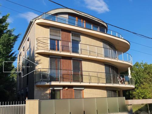 an apartment building with a round top balcony at ES-5 Luxory Homes in Budapest