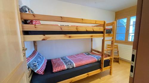Postel nebo postele na pokoji v ubytování 250m zur Hannigalp und Bergpanorama
