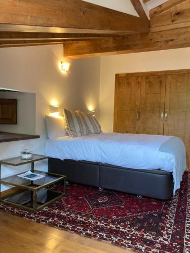 Ένα ή περισσότερα κρεβάτια σε δωμάτιο στο La Valuisilla, hotel rural