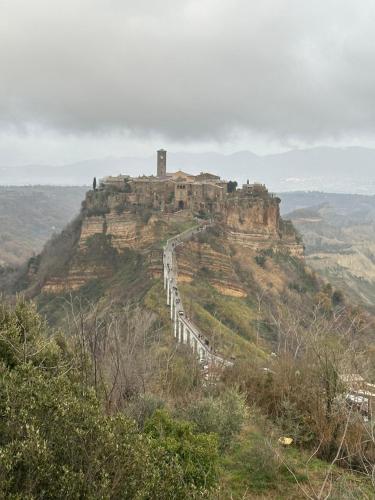 a castle on the top of a mountain at La casa di Zoe-ARTANDTRAVEL in Montefiascone