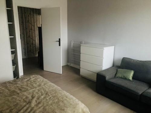 Posezení v ubytování Appartement lumineux 2 chambres