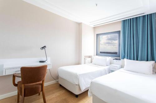 Radisson Residences Avrupa TEM Istanbulにあるベッド
