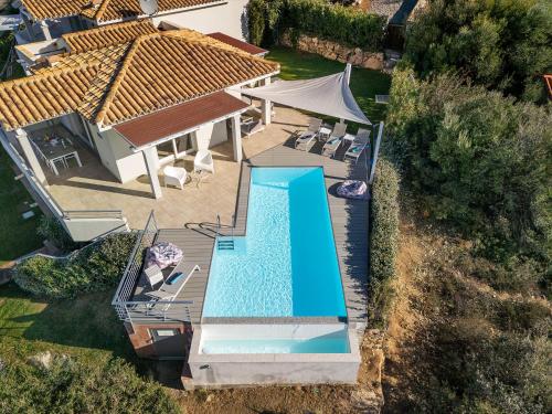 an aerial view of a house with a swimming pool at Villa Serenity in Terra Mala