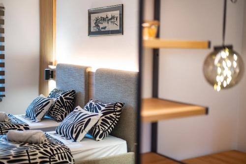 Ένα ή περισσότερα κρεβάτια σε δωμάτιο στο Apartman Joe