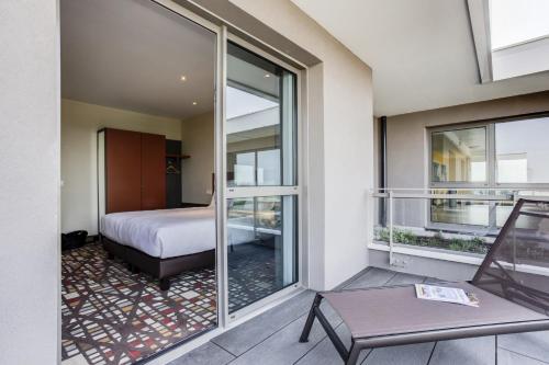 Postel nebo postele na pokoji v ubytování Hotel ParKest