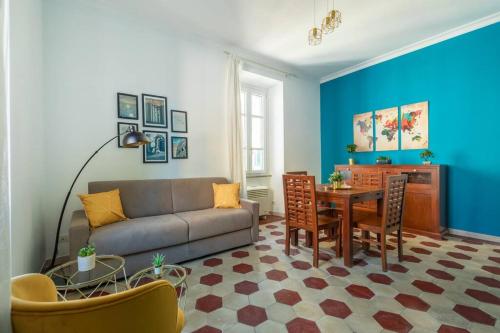 a living room with a couch and a table at G & G Maisonette Testaccio in Rome