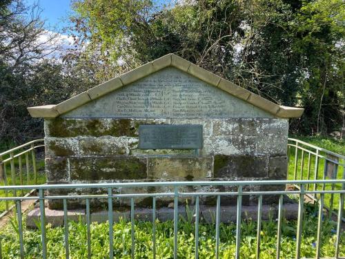 a monument in a park with a metal fence at Shardlow Cottage in Derby