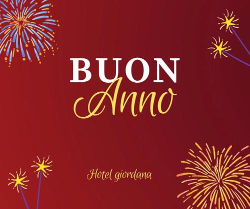 a sign that reads burn amo with fireworks at HOTEL GIORDANA in Loano